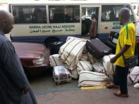 The bus bought by Pres. Koroma transporting some luggaes