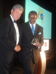 Dr. Kandeh Yumkella -from right receives Africa-America Institute 's Distinguished Alumni Awards at the New York Hilton Hotel in Manhattan