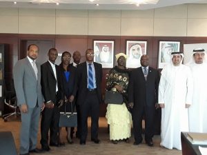 Amb.-Timbo-3rd-from-right-flanked-by-his-wife-embassy-staff-UAE-Minister-of-Economy-and-team.