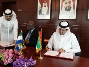 Amb.-Timbo-signing-economic coperation with UAE-Dep. Economy Minister.