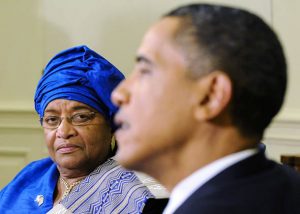 President of Liberia Ellen Johnson Sirleaf (L) listens to U.S. President Barack Obama talk as he welcomes her in the Oval Office at the White House in Washington, May 27, 2010.