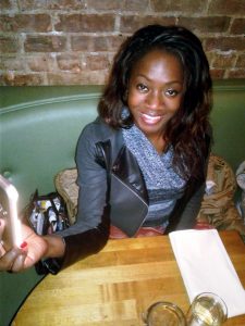 Azania takes a selfie after an interview in Lido Italian Restaurant in Harlem, New York